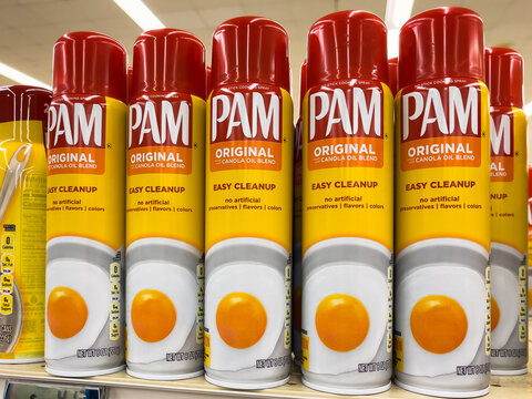 ATLANTA, GEORGIA - APRIL 12, 2023 : PAM brand non-stick cooking oil spray on shelf at grocery store supermarket.