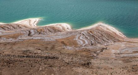 Salty shoreline of Dead Sea near Wadi Mujib, Jordan