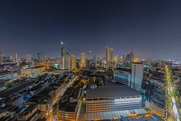 View over the skyline of Bangkok from aerial position at night