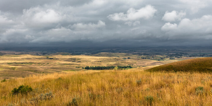 View of the rolling hills and threatening weather from the Bozeman Trail Head off I-90 near Sheridan, Wyoming, USA; Wyoming, United States of America