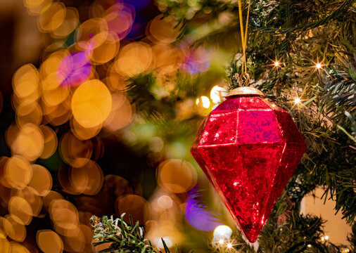 Christmas tree ornament and warm lights; Kelowna, British Columbia, Canada