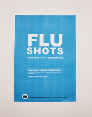 Healthcare background, vaccine and flu shot poster on wall in clinic, hospital and medical...