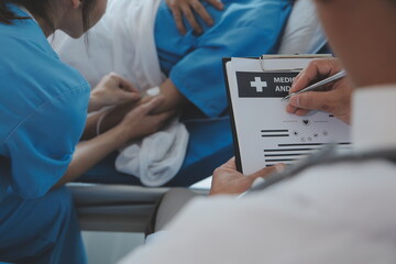 Women Asian doctors hold the patient hand and encourage and provide medical advice While checking the patient health in bed. Concept of Care and compassion, antenatal care, Threatened abortion