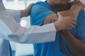 Obraz premium Women Asian doctors hold the patient hand and encourage and provide medical advice While checking the patient health in bed. Concept of Care and compassion, antenatal care, Threatened abortion