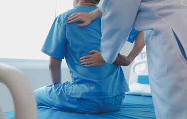 Women Asian doctors hold the patient hand and encourage and provide medical advice While checking...