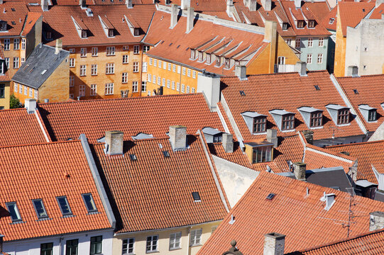 Aerial view of red roofs of traditional houses in the city center of Copenhagen in Denmark