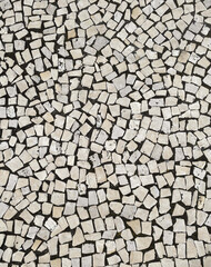 White paving stones on the roads of Portugal, top view