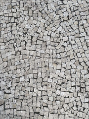 White paving stones on the roads of Portugal, top view