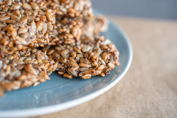 Vegan cookies made of banana and different seeds, photographed with natural light