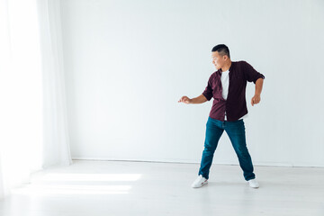 a man dancing bachata kizomba latina in a dance hall