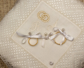 wedding rings on a pillow