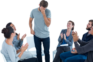 Rehab group applauding delighted man standing up