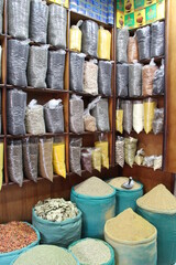 Oriental spices and seasonings in bags and parcels are sold at market