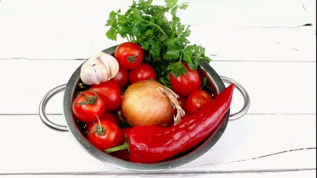Chef put on table fresh vegetables for preparation vegetarian healthy salad.