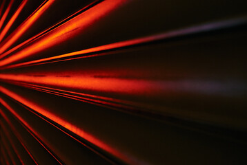 abstract red lines reflected on metal background