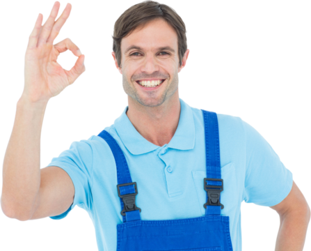 Smiling carpenter showing OK sign - Powered by Adobe