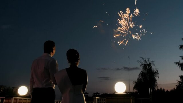 4k travel video couple watching fireworks on romantic evening