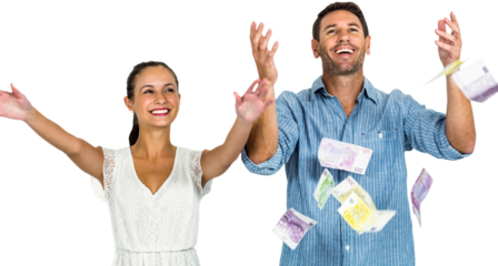 Happy couple throwing money