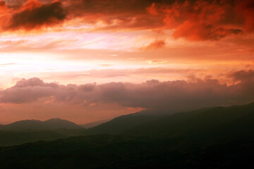 summer foggy scenery, scenic sunset view in the mountains