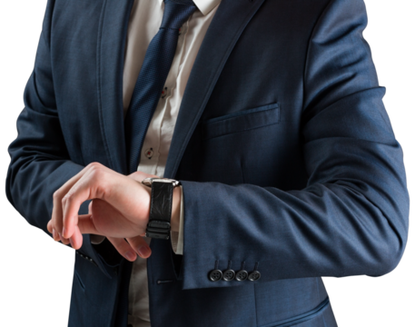 Businessman checking the time on watch