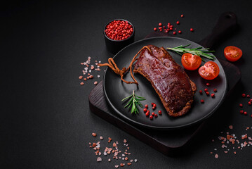 Delicious duck fillet or breast grilled or smoked with spices and salt