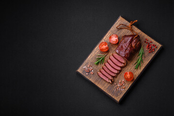 Delicious duck fillet or breast grilled or smoked with spices and salt