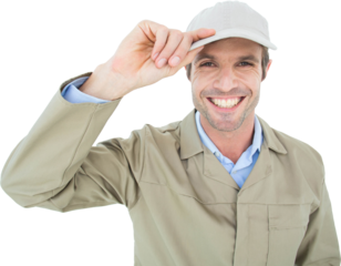 Portrait of happy delivery man holding cap
