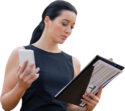 Businesswoman with mobile phone reading document