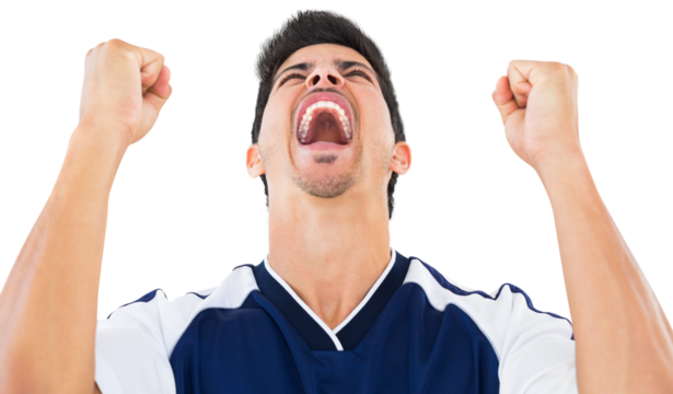 Football player screaming while clenching fists