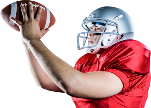 Side view of American football player throwing ball