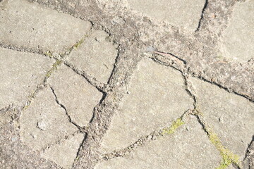 Asphalt, brick, stones and wooden texture. Yellow and green graphic materials	