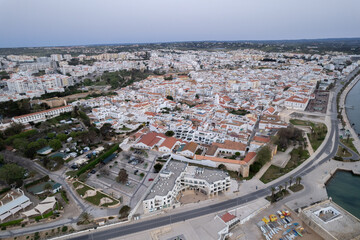 Fototapeta premium Aerial from the city Lagos portugal with the Forte da Bandeira in view with the beach praia