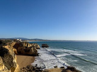 Praia Dona Ana beach with turquoise sea water and cliffs, Portugal. Beautiful Dona Ana Beach (Praia Dona Ana) in Lagos, Algarve, Portugal.
