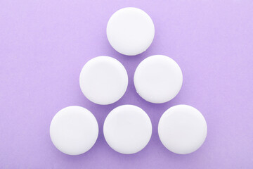 Blank white badges on lilac background