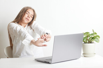 tired girl with laptop on white background