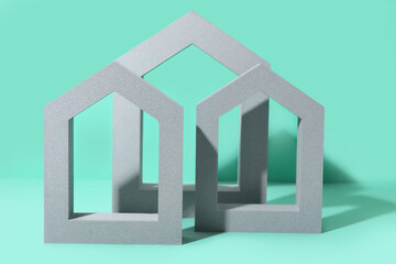 Decorative house shaped frames on turquoise background