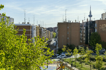 Facades of buildings in a neighborhood of the city of Madrid near the telecommunications tower