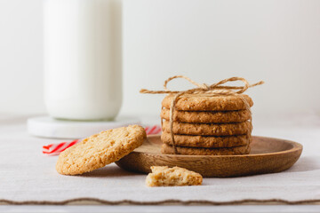 Oatmeal cookies on a wooden plate