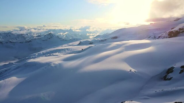 Aerial view of the two-headed peak of Mount Elbrus at sunset