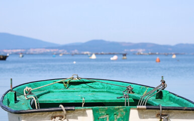 Fototapeta na wymiar A fishing boat near the beach