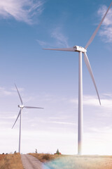 Fototapeta na wymiar eco power energy concept idea. wind turbine in a beautiful sky