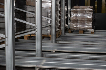 Metal parts of the rack for inserting pallets.