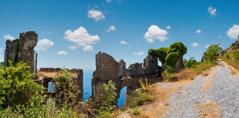 The ruins of the original settlement of Maratea on a rocky escarpment just below the Christ the...