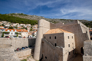 Fototapeta na wymiar Tower and wall in the medieval walled city of Dubrovnik, Croatia