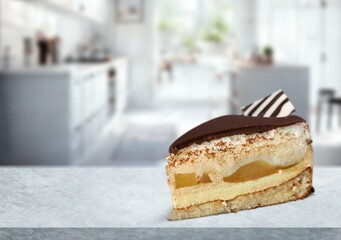 Tasty sweet fresh cake on desk