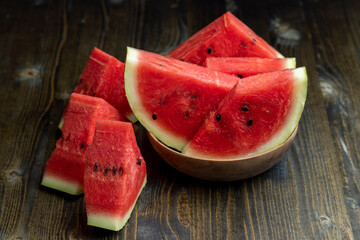 Sliced red and ripe watermelon on the table