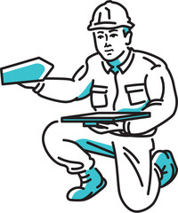 コテを使って壁を仕上げる、男性の左官職人