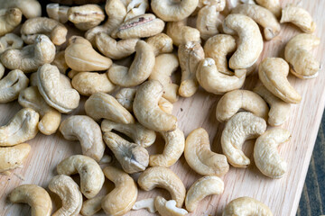 Fresh peeled cashew nuts on the table