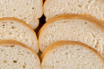 Sliced soft French baguette made of wheat flour