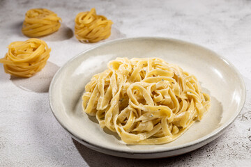 Delicious fettuccine pasta with white cheese sauce. Fettuccine pasta with Alfredo sauce.